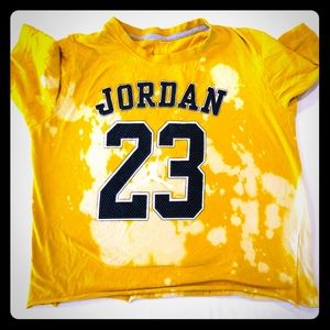 Yellow destroyed Jordan crop top.